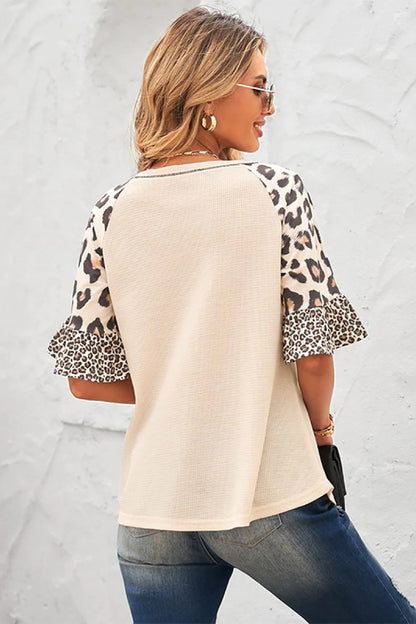 Leopardo con cuello en V